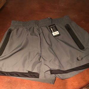 Ryderwear polyester shorts with trading shorts as lining